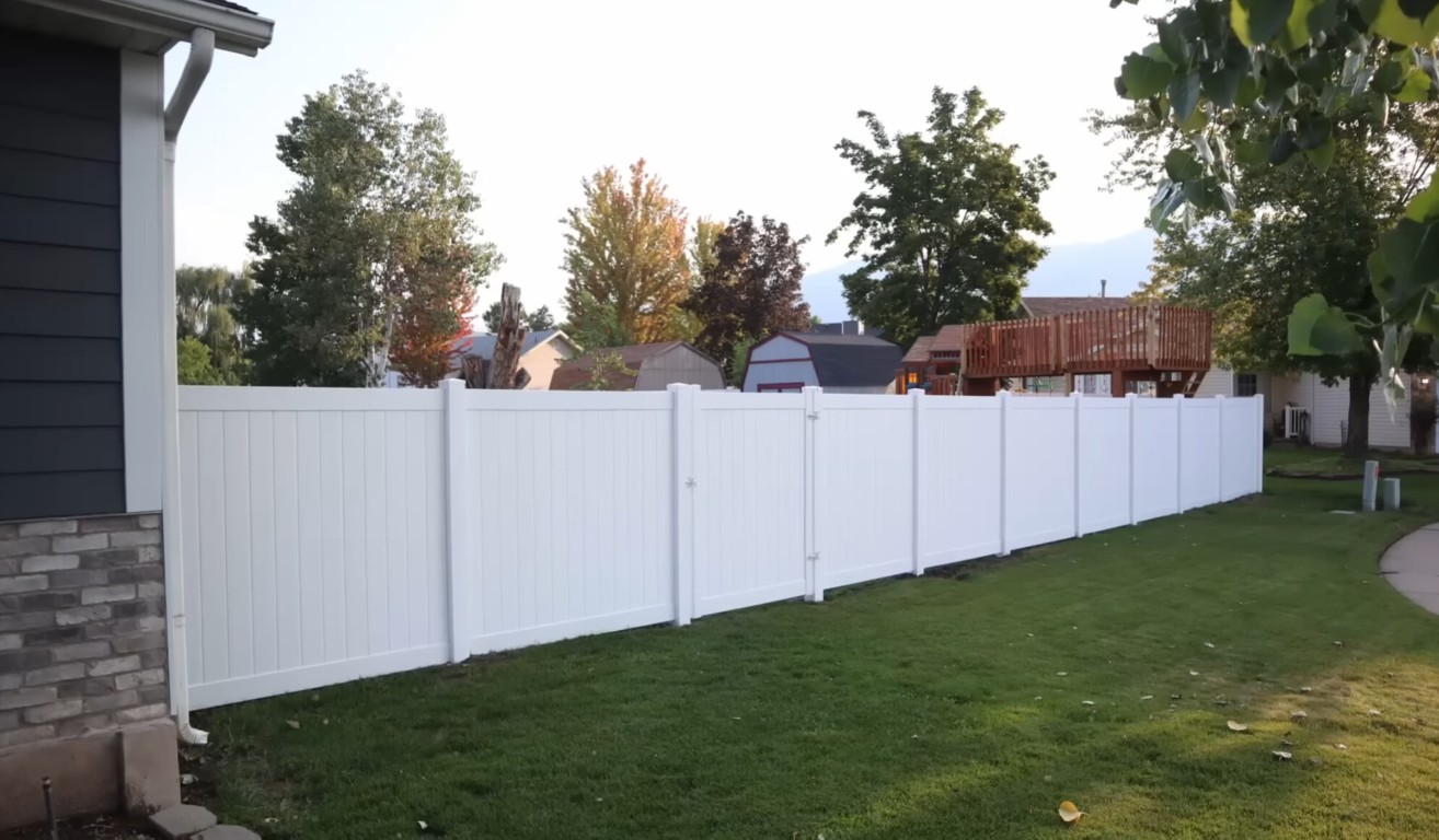Reliable vinyl picket fence installation with gate